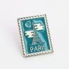Pin's Timbre paris bleu avec tour Eiffel Clj Charles Le Jeune