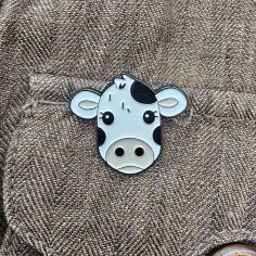 Pin's Vache noire et blanche Clj Charles Le Jeune 2